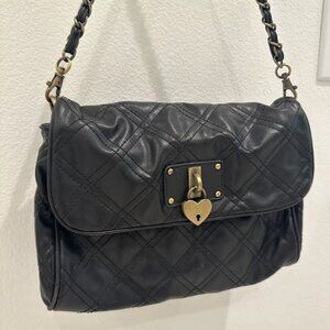 Elegant quilted black purse with chain strap